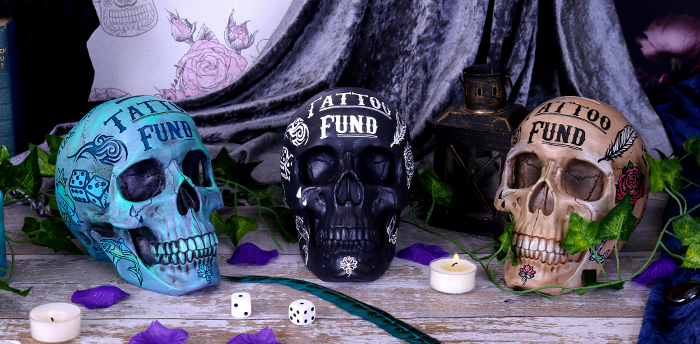 Tattoo Fund Skulls Three Tattoo Fund Skulls; in Blue, Black, and Bone.